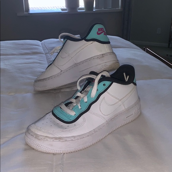 white and teal nike shoes